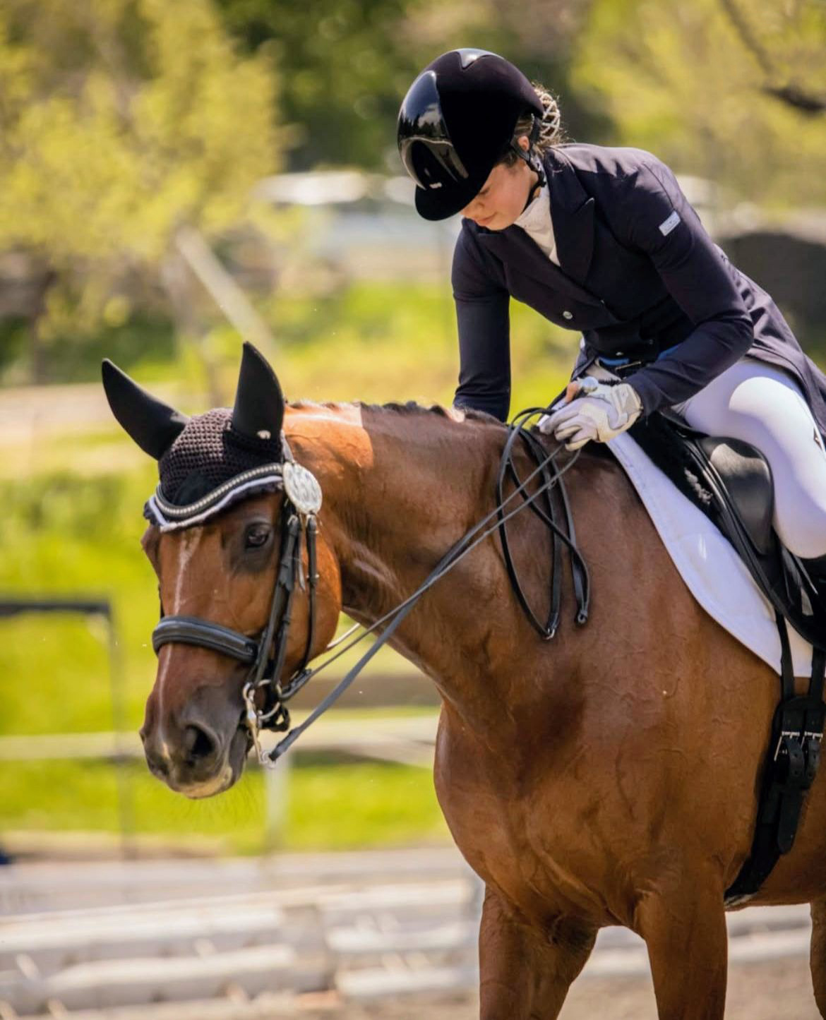 Mika and her horse in a moment of connection between transitions